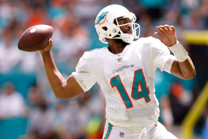 Jacoby Brissett throwing for the Dolphins.