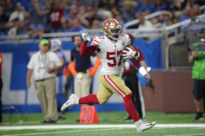 San Francisco 49ers linebacker Dre Greenlaw returns an interception for a touchdown.