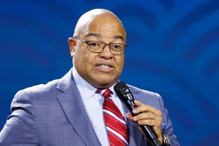 NBC announcer Mike Tirico at an event.