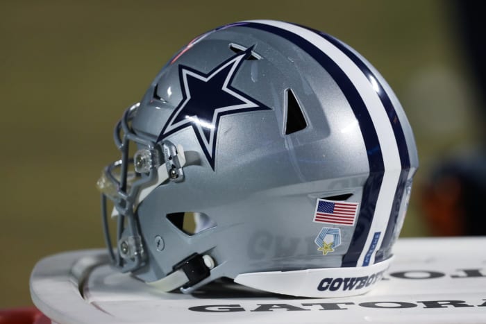 Dallas Cowboys helmet on the field.