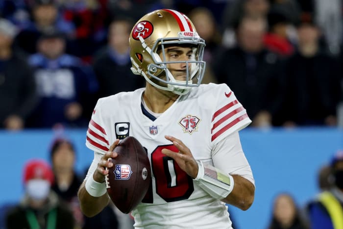 San Francisco 49ers quarterback Jimmy Garoppolo looks to throw the ball.