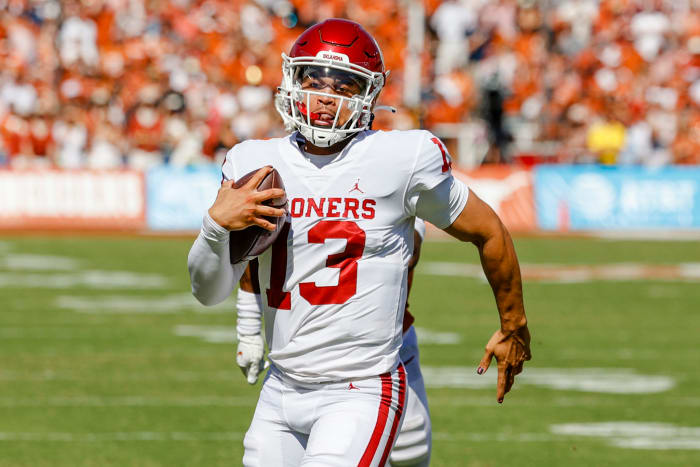 Oklahoma quarterback Caleb Williams runs against Texas.