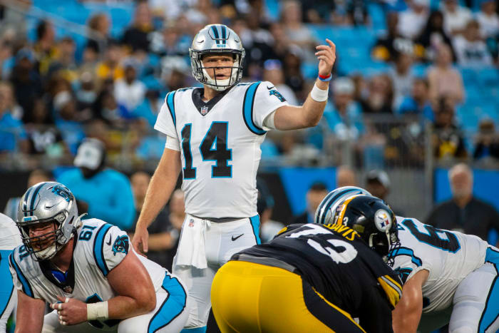 Sam Darnold controls the Panthers' huddle.