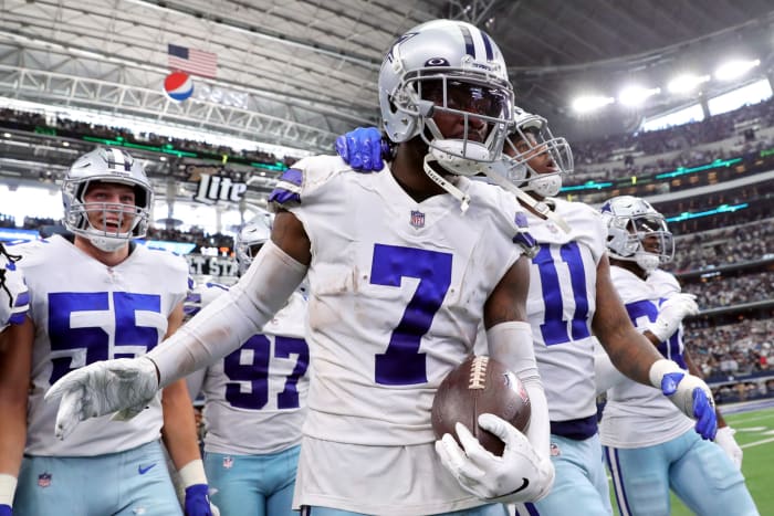 Trevon Diggs celebrates with his Cowboys teammates after an interception.