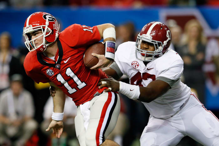 Aaron Murray tries to escape an Alabama defender.
