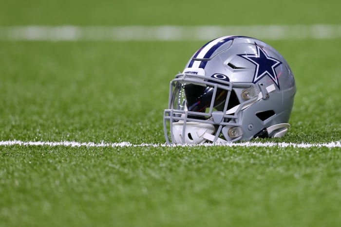 Dallas Cowboys helmet on the field.