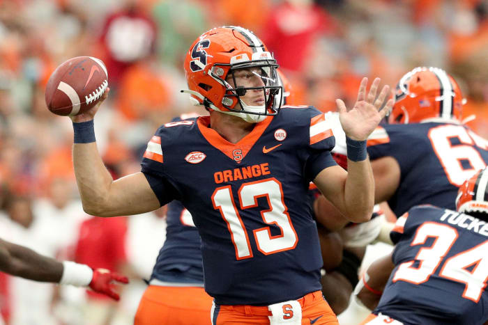 Syracuse quarterback Tommy Devito throws a pass.