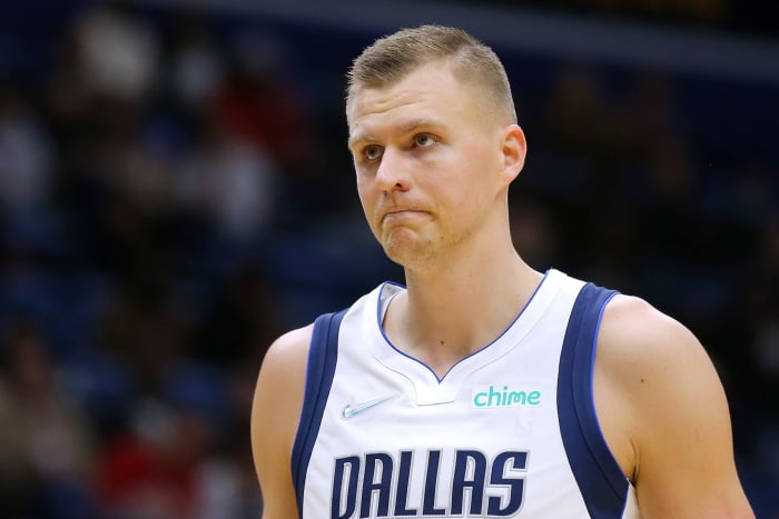 Dallas Mavericks big man Kristaps Porzingis frowning.