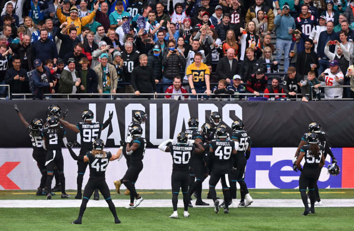 Jacksonville Jaguars players celebrate in London.