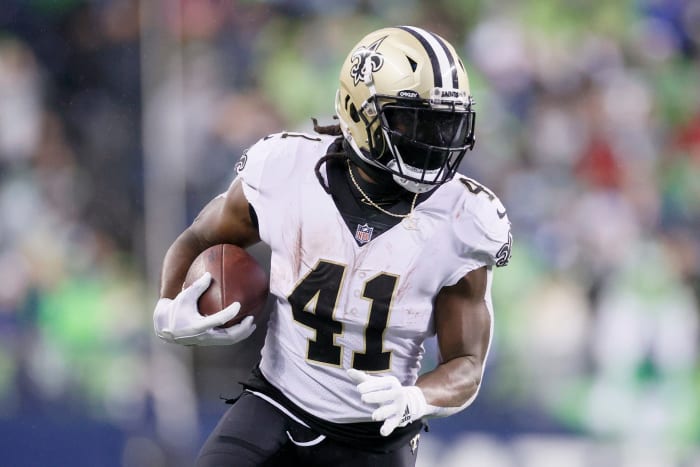 Alvin Kamara runs for the Saints.