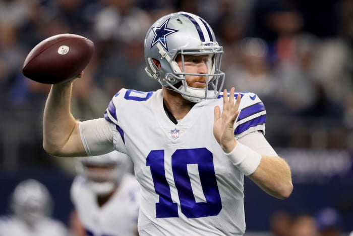 Dallas Cowboys quarterback Cooper Rush on the field.