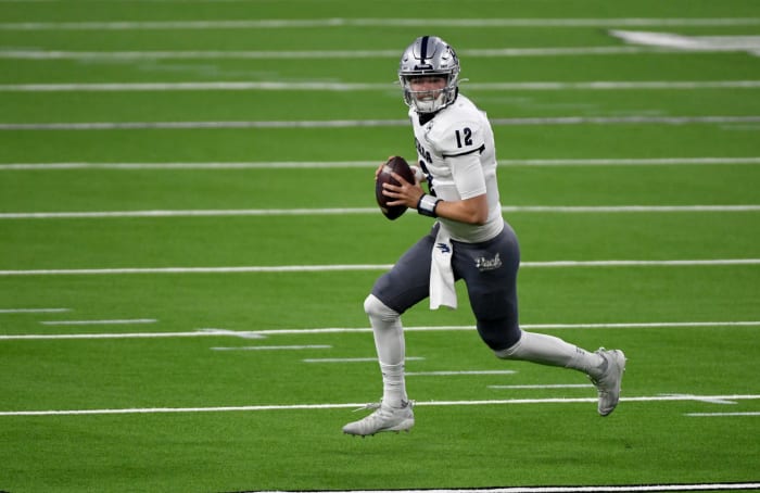 Carson Strong runs on the field. The Minnesota Vikings scouted him in October.