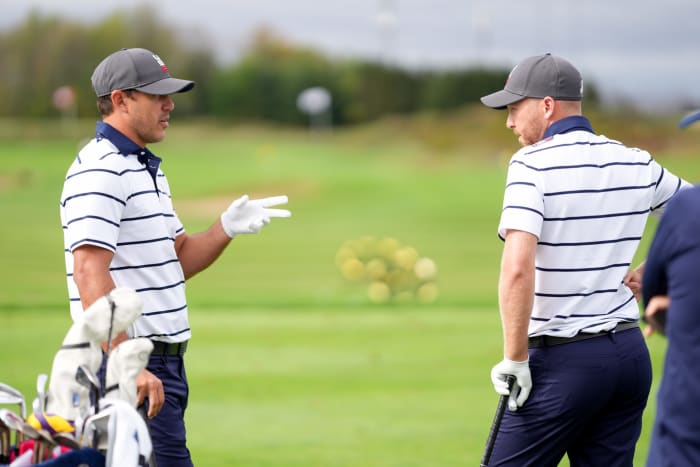 Brooks Koepka and Bryson DeChambeau talking at the Ryder Cup.