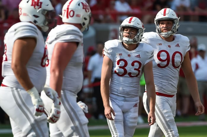 Connor Culp talks to his Nebraska football teammates during a game against Buffalo.