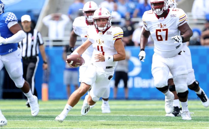 Rhett Rodriguez runs the ball.