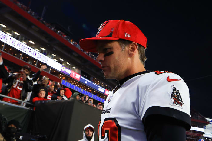 Tampa Bay Buccaneers quarterback Tom Brady walks to the locker room.