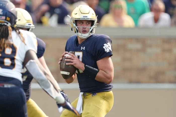 Notre Dame's Jack Coan drops back to pass.