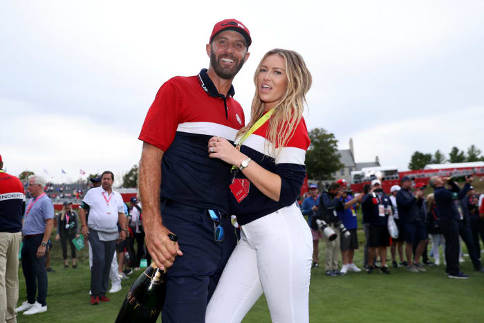 Dustin Johnson celebrates with Paulina Gretzky.