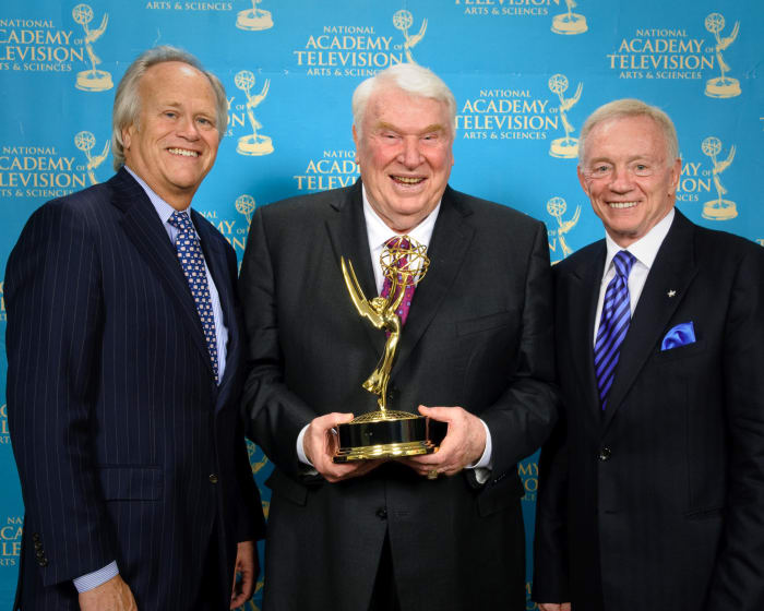 Jerry Jones stands alongside John Madden.