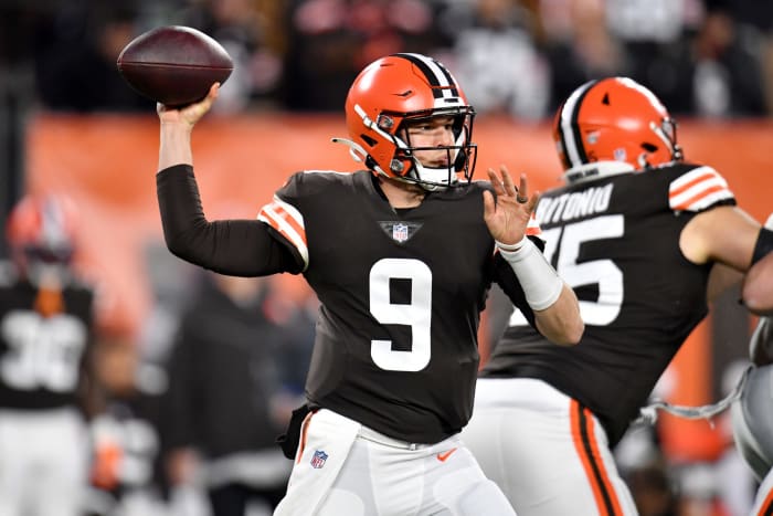 Nick Mullens attempts a pass.