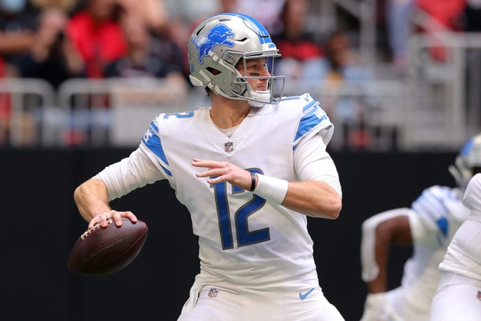 Detroit Lions quarterback Tim Boyle winds up to pass.
