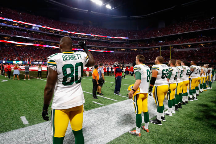 Martellus Bennett raises fist.