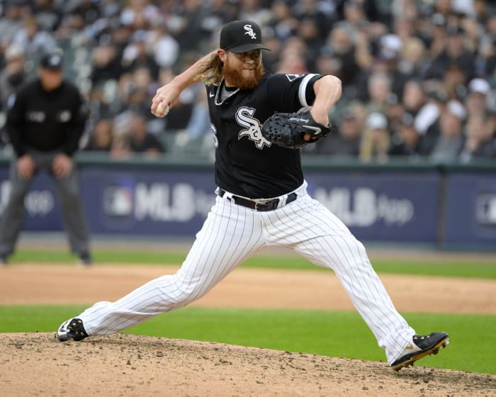 White Sox pitcher Craig Kimbrel delivers a pitch in a game.