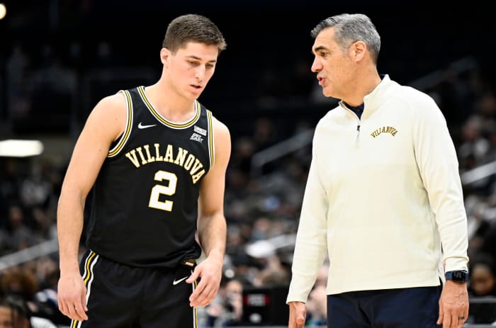 Connor Gillespie and Jay Wright on the court.