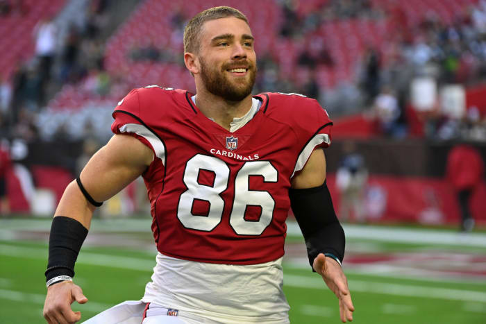 Zach Ertz smiles as he runs off the field.