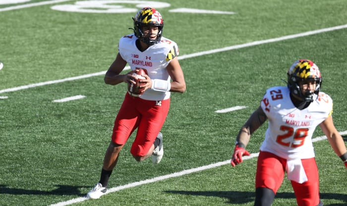 Taulia Tagovailoa rolls out for Maryland football vs. Indiana.