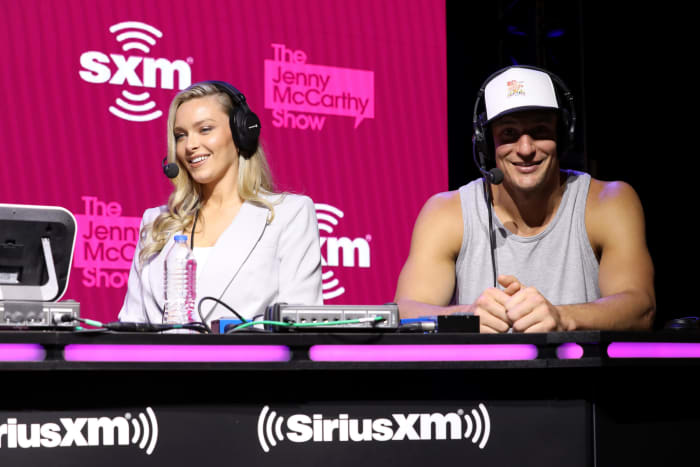 Camillle Kostek and Rob Gronkowski speak onstage at Super Bowl LIV.