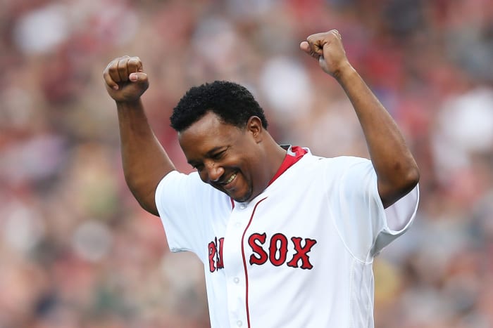 Pedro Martinez celebrating in a Red Sox uniform.