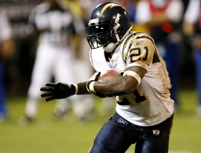 LaDainian Tomlinson running the football.