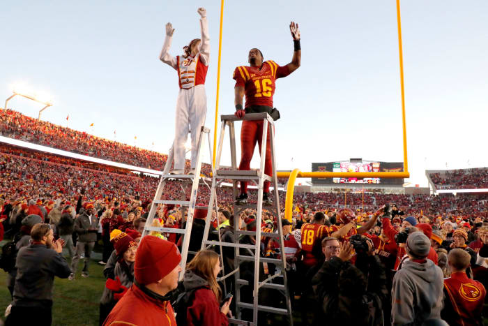 Iowa State football player directs the Iowa State band.