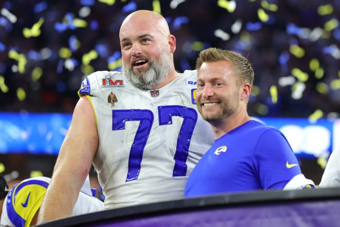 Los Angeles Rams head coach Sean McVay and offensive tackle Andrew Whitworth celebrate a Super Bowl win.