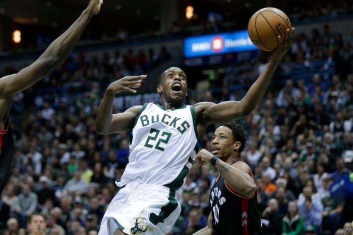 Kris Middleton driving to the basket.