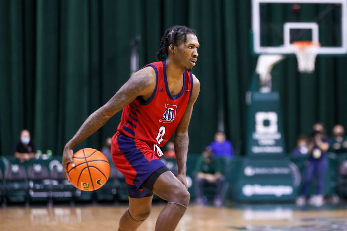 Detroit guard Antoine Davis dribbles in a game.