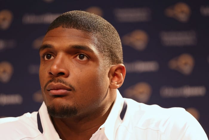 Michael Sam talking to the media.