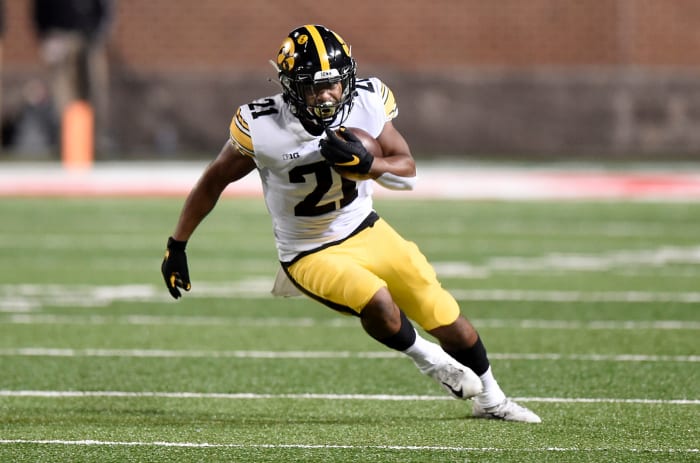 Ivory Kelly-Martin runs the ball for Iowa.