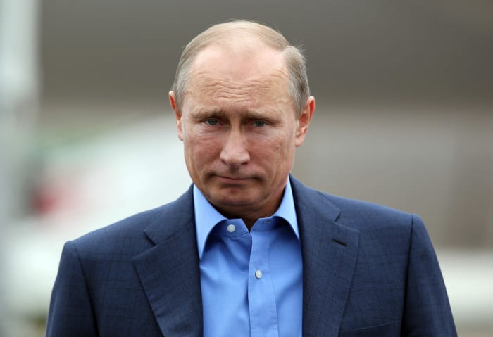 Vladimir Putin at a world leaders conference.