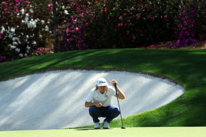Cameron Smith lines up a putt at the Masters.
