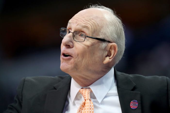Miami head coach Jim Larranaga observing the action.