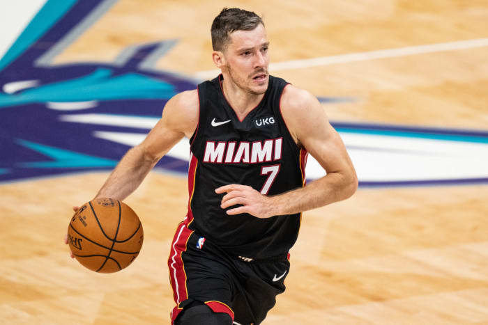 Goran Dragic dribbling the ball with his right hand.