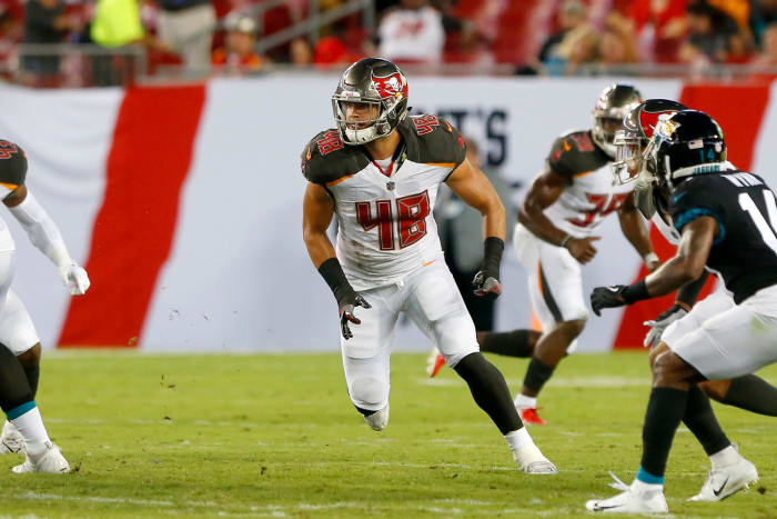 Jack Cichy runs to make a play.