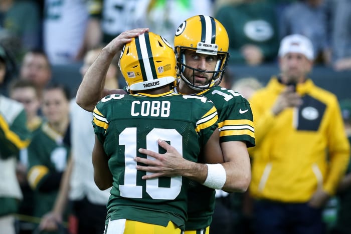 Aaron Rodgers hugs Randall Cobb during a Green Bay Packers vs.  Chicago Bears game.