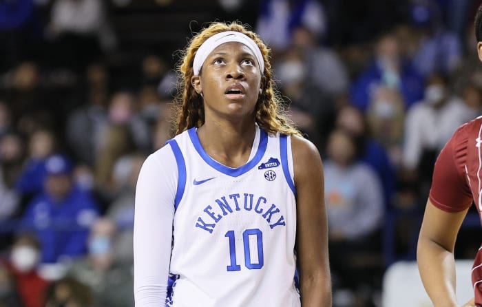 Rhyne Howard of Kentucky Wildcats looks on.