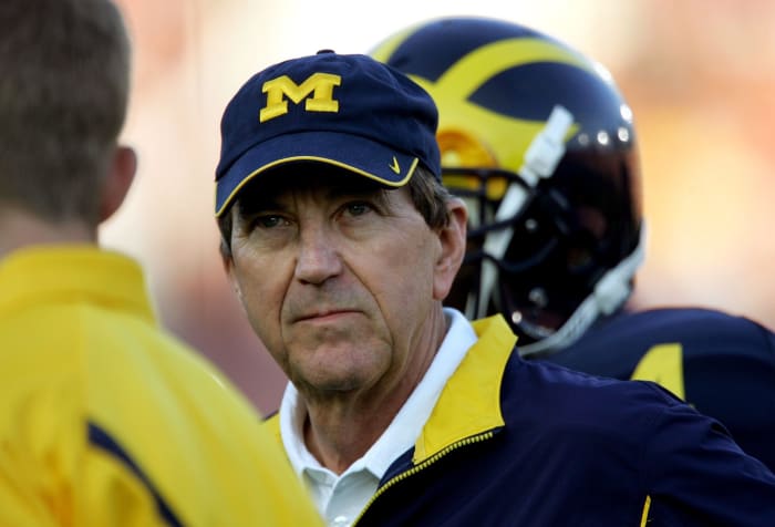 Lloyd Carr coaching Michigan.