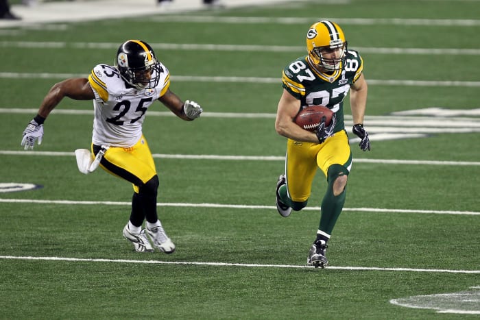 ARLINGTON, TX - FEBRUARY 06: Jordy Nelson #87 of the Green Bay Packers runs for yards after the catch against Ryan Clark #25 of the Pittsburgh Steelers during Super Bowl XLV at Cowboys Stadium on February 6, 2011 in Arlington, Texas. (Photo by Mike Ehrmann/Getty Images)