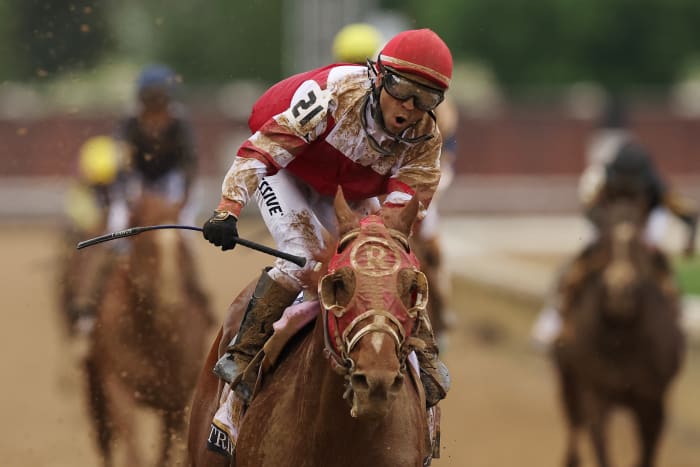 LOUISVILLE, KENTUCKY - MAY 07: Jockey Sonny Leon reacts as Rich Strike wins the 148th running of the Kentucky Derby at Churchill Downs on May 07, 2022 in Louisville, Kentucky. (Photo by Ezra Shaw/Getty Images)
