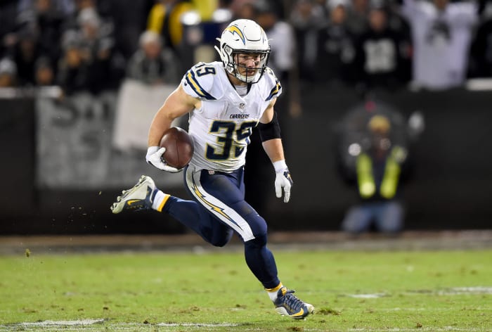 OAKLAND, CA - DECEMBER 24: Danny Woodhead #39 of the San Diego Chargers rushes with the ball against the Oakland Raiders during their NFL football game at O.co Coliseum on December 24, 2015 in Oakland, California. (Photo by Thearon W. Henderson/Getty Images)